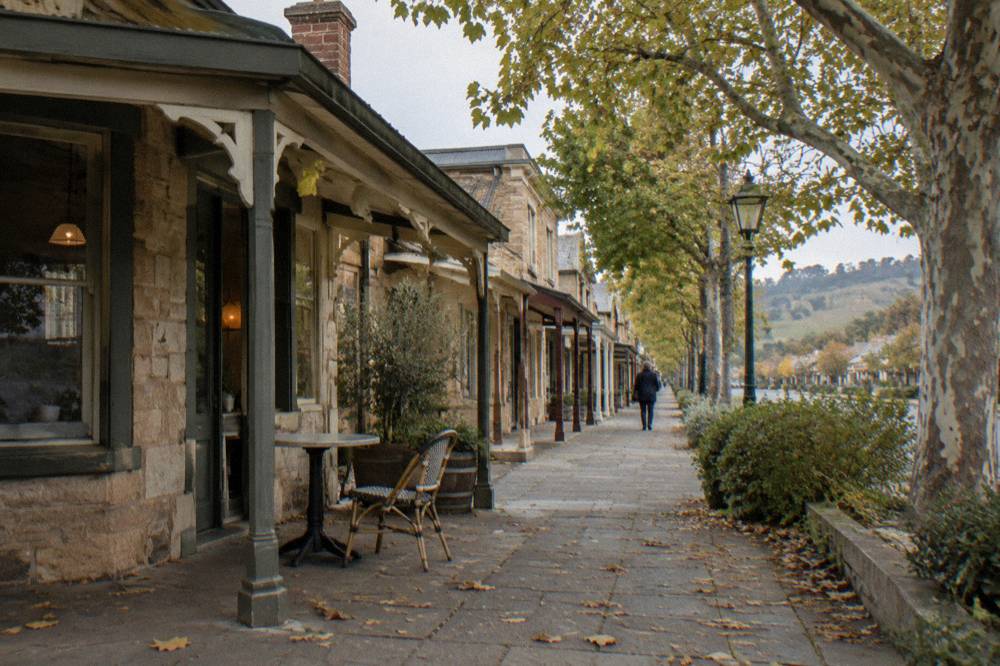 Historic main street with timber verandah shops and leafy plane trees