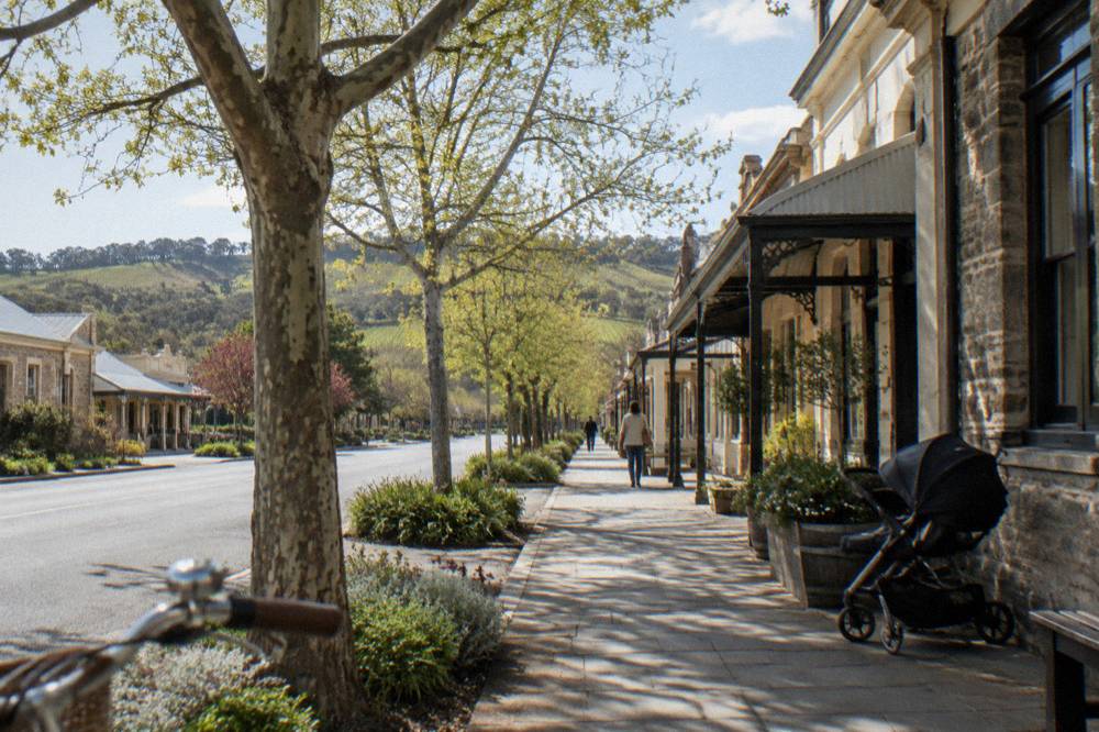Stone buildings and leafy main street of a Barossa Valley heritage town
